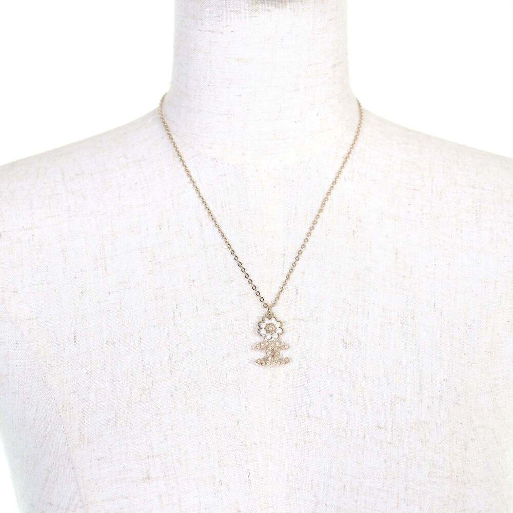 CHANEL Gold Pearl Logo Necklace - Picture 3 of 8